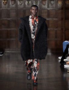 A model walks the runway at the Edward Crutchley show during London Fashion Week Men's January 2018 at the Ironmongers Hall on January 6, 2018 in London, England.