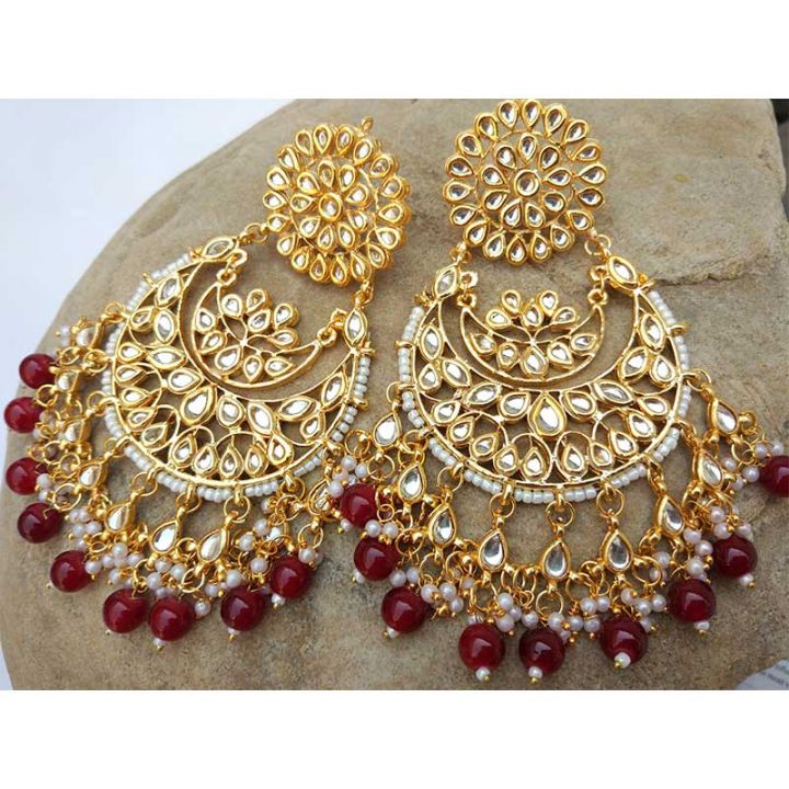 Look stunning in your evening wear with these Kundan Chandbali earrings with Red and White Pearl from Fashioncrab